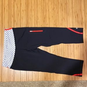 Lululemon crop black, white polka dot with orange highlight leggings